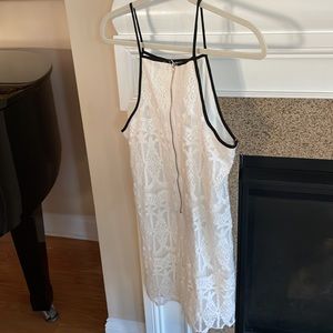 White lace with black trim dress